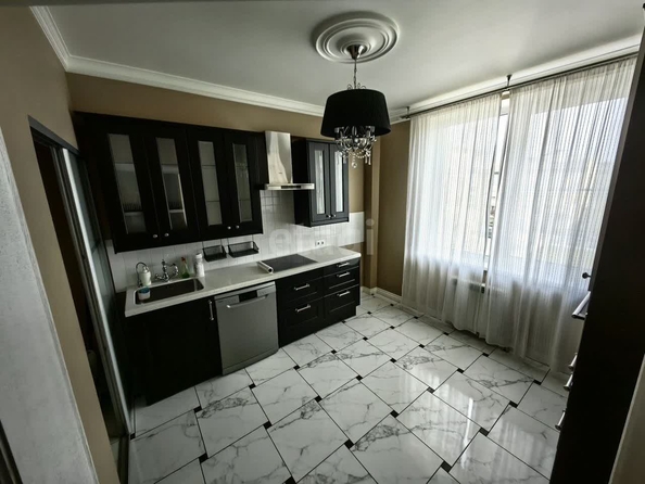 
   Продам 3-комнатную, 107.2 м², 6-й микрорайон, 15

. Фото 1.