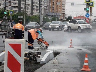Завершить ремонт дорог в Красноярске мешают погодные условия